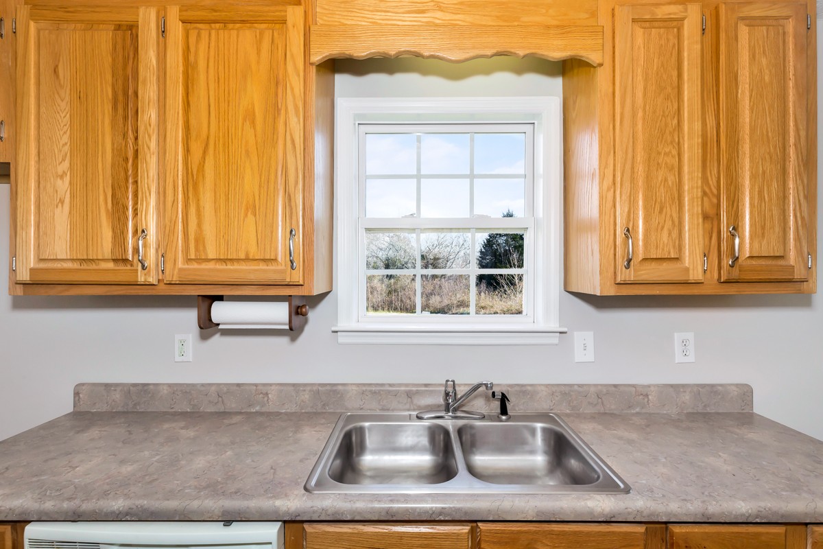 244 East Prospect Road Fayetteville, TN 37334 - Photo 7 of 24 a kitchen with a sink and a window