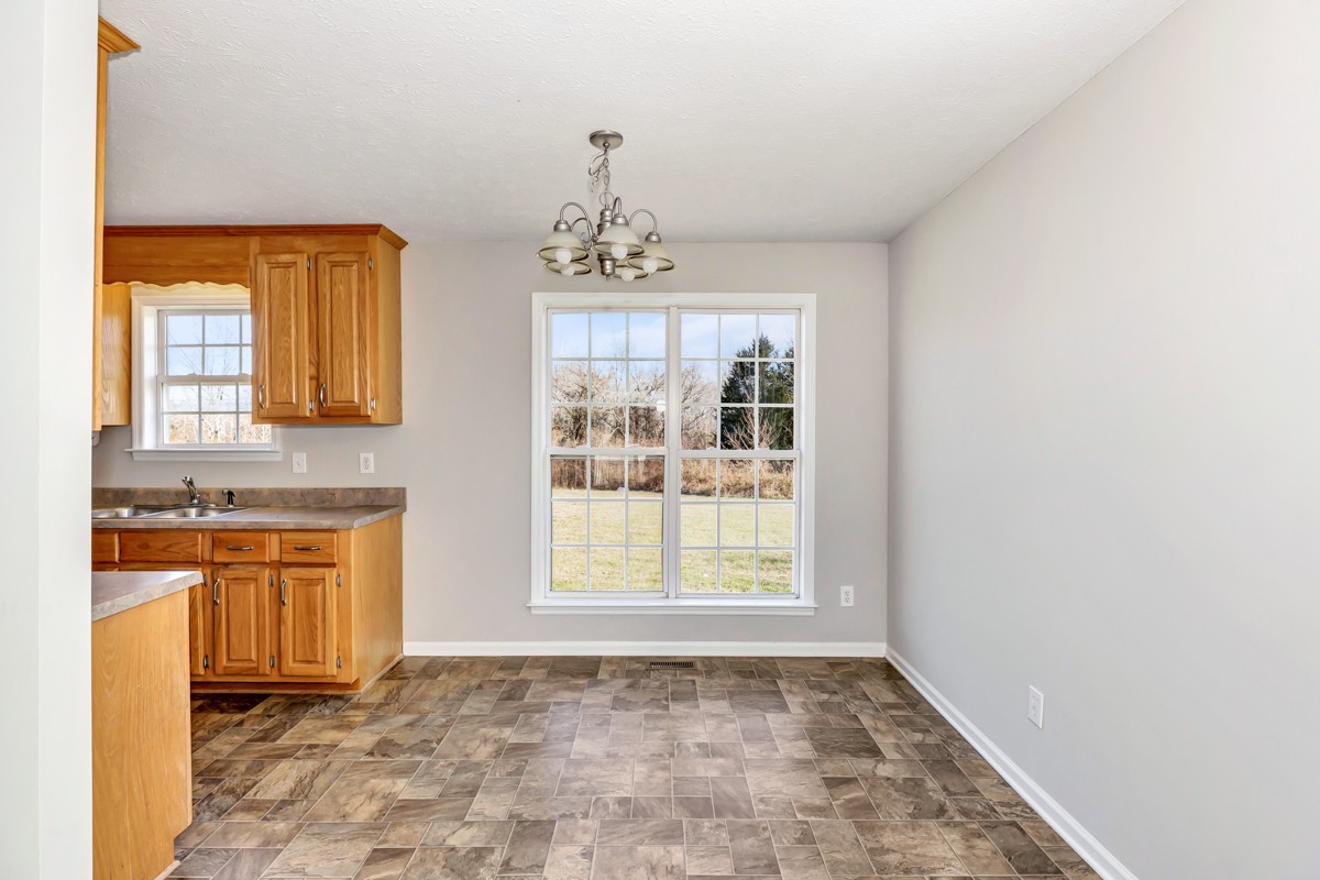 244 East Prospect Road Fayetteville, TN 37334 - Photo 8 of 24 a view of a kitchen with a sink and windows