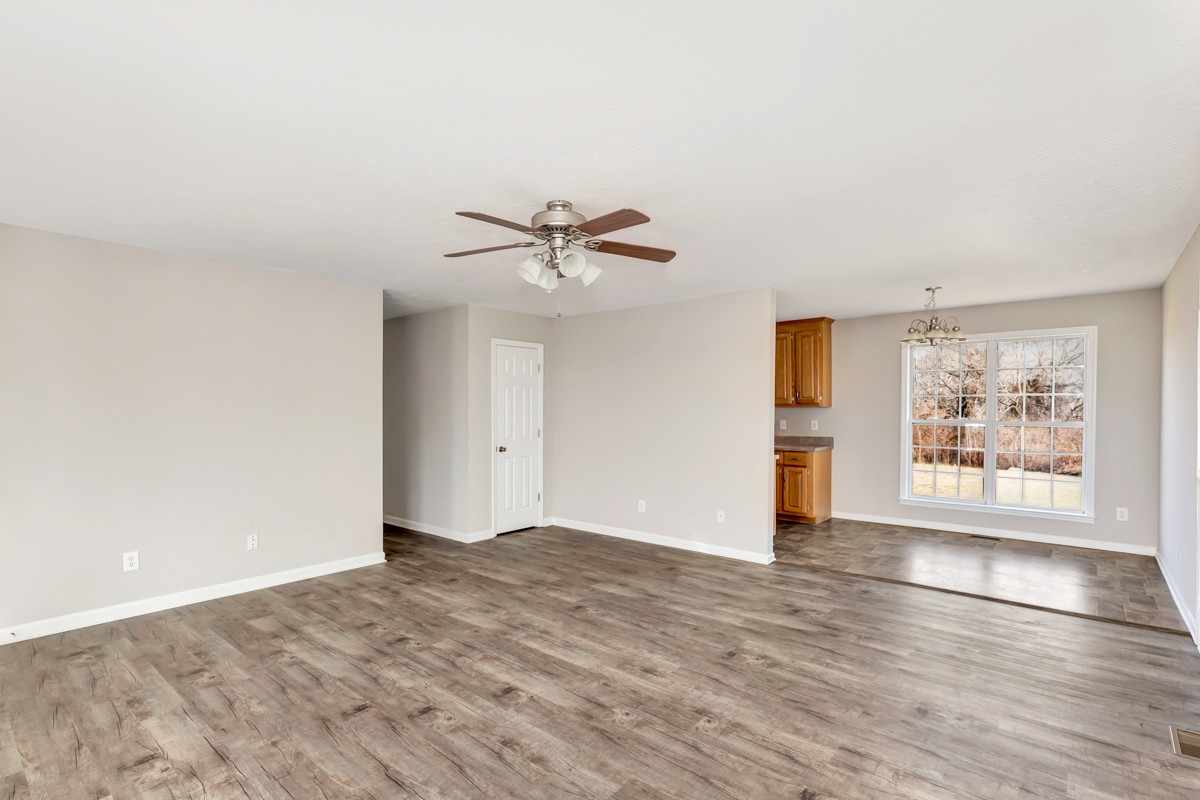 244 East Prospect Road Fayetteville, TN 37334 - Photo 10 of 24 wooden floor in an empty room with a window