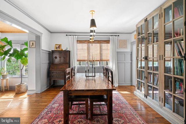 a view of a livingroom with furniture window and wooden floor
