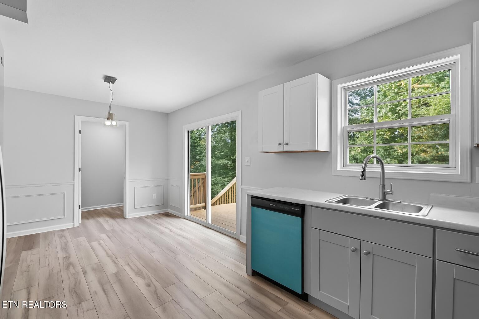 3844 Isaac Avenue Morristown, TN 37814 - Photo 10 of 23 a kitchen with a sink window and cabinets