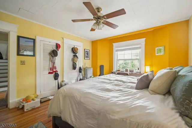 a bed room with a bed and a window