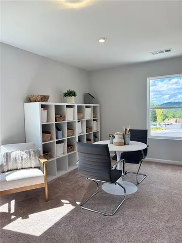 a bed room with a bed and a couch