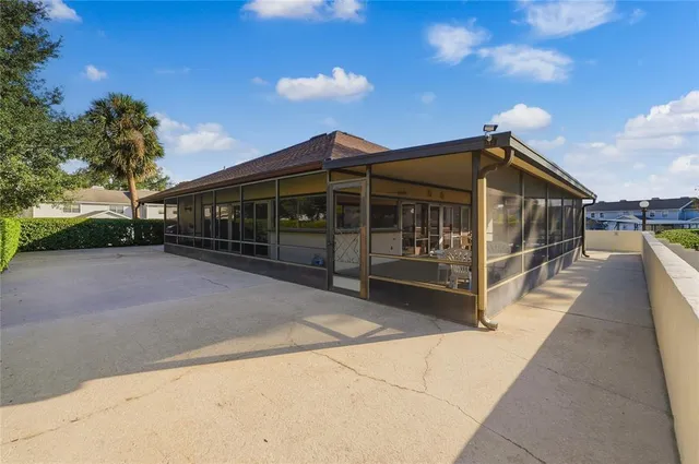 a view of a house with a street
