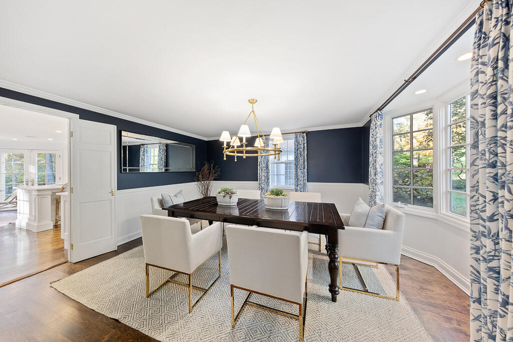 21 Halter Lane Darien, CT 06820 - Photo 17 of 45 a dining room with furniture and window