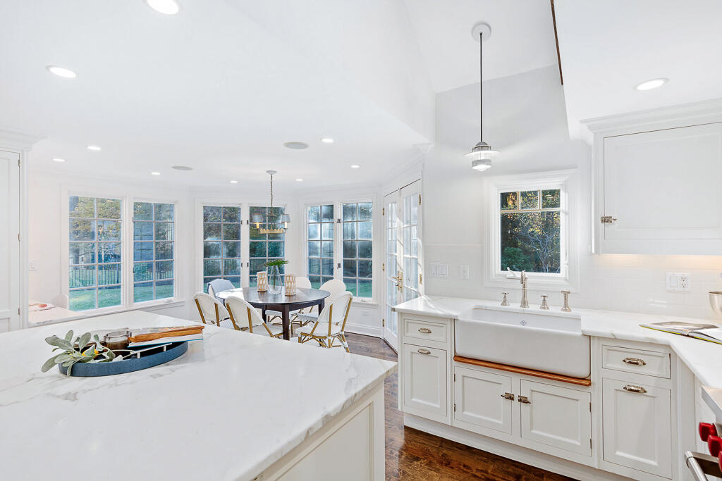 21 Halter Lane Darien, CT 06820 - Photo 20 of 45 a view of a kitchen with granite countertop a sink and a window