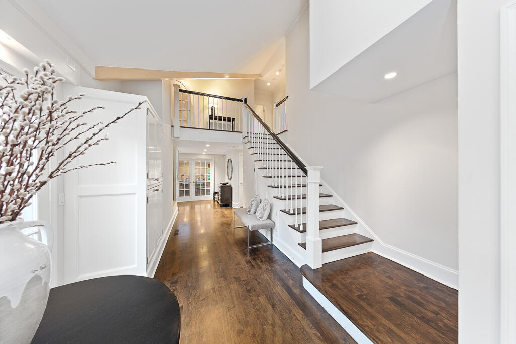 21 Halter Lane Darien, CT 06820 - Photo 25 of 45 a view of entryway and hall with wooden floor