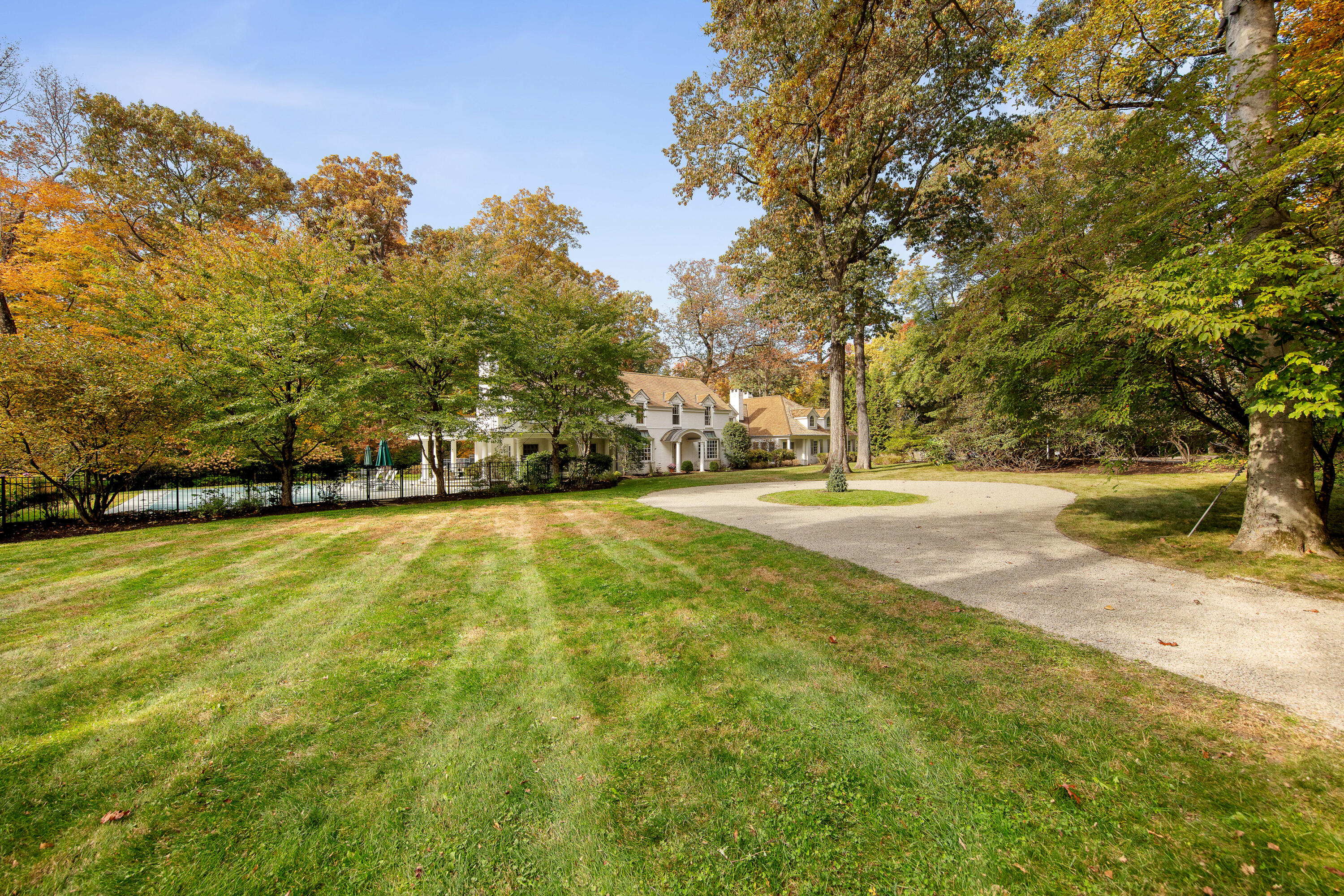 21 Halter Lane Darien, CT 06820 - Photo 3 of 45 a view of yard and swimming pool