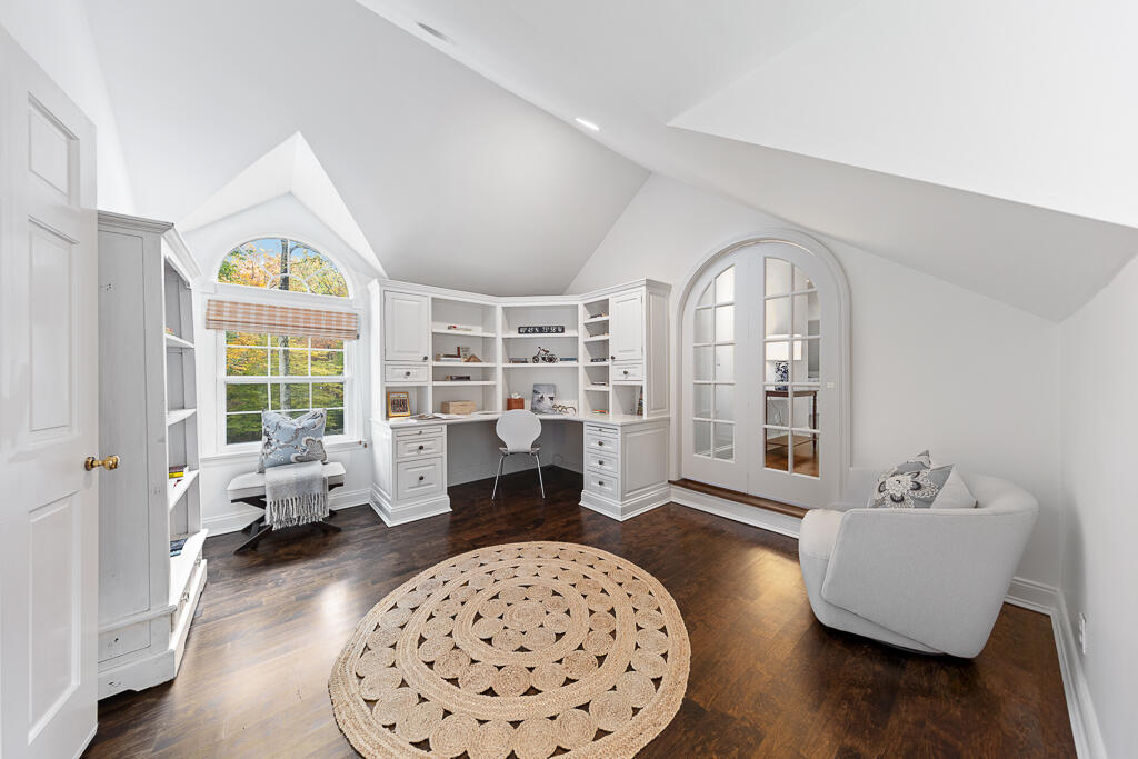 21 Halter Lane Darien, CT 06820 - Photo 35 of 45 a living room with furniture and a large window