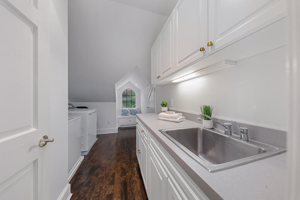 21 Halter Lane Darien, CT 06820 - Photo 38 of 45 a kitchen with a sink and a refrigerator