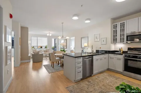 a kitchen with lots of counter top space and appliances