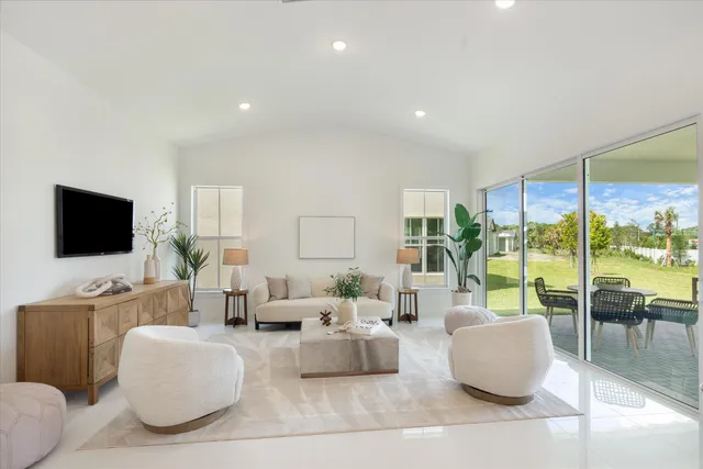 a living room with furniture and a table