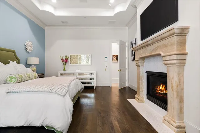 a bed room with a bed and a fireplace