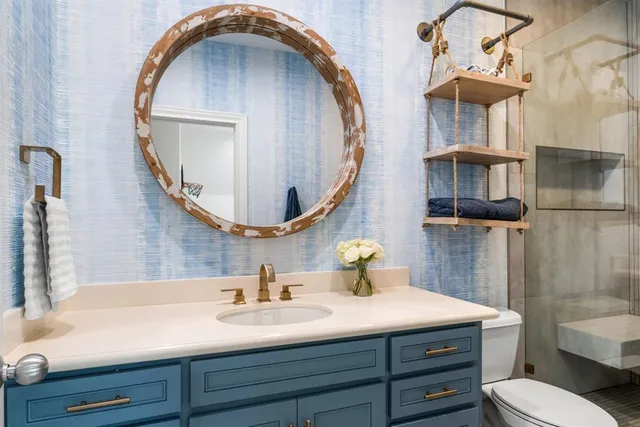 a bathroom with a sink and a mirror