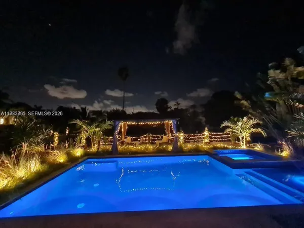 a view of outdoor space with deck area and outdoor seating