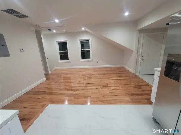 a large room with wooden floor