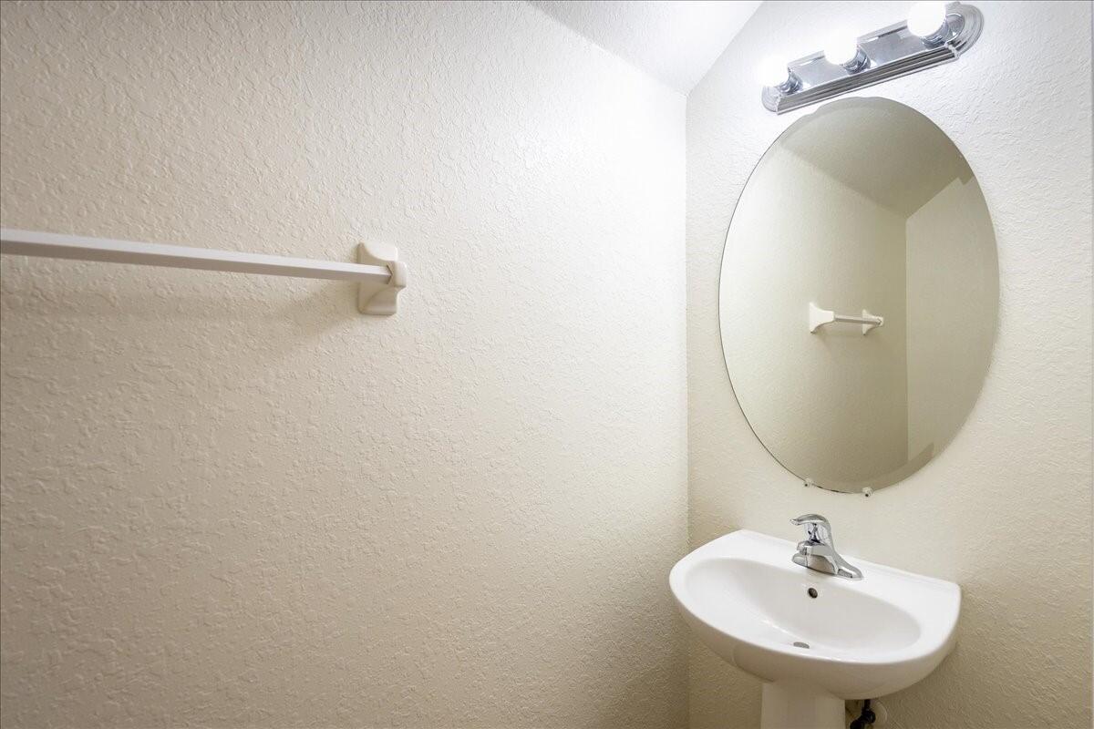 104 Southwest Otter Run Place Stuart, FL 34997 - Photo 28 of 51 104 SW Otter Run powder room