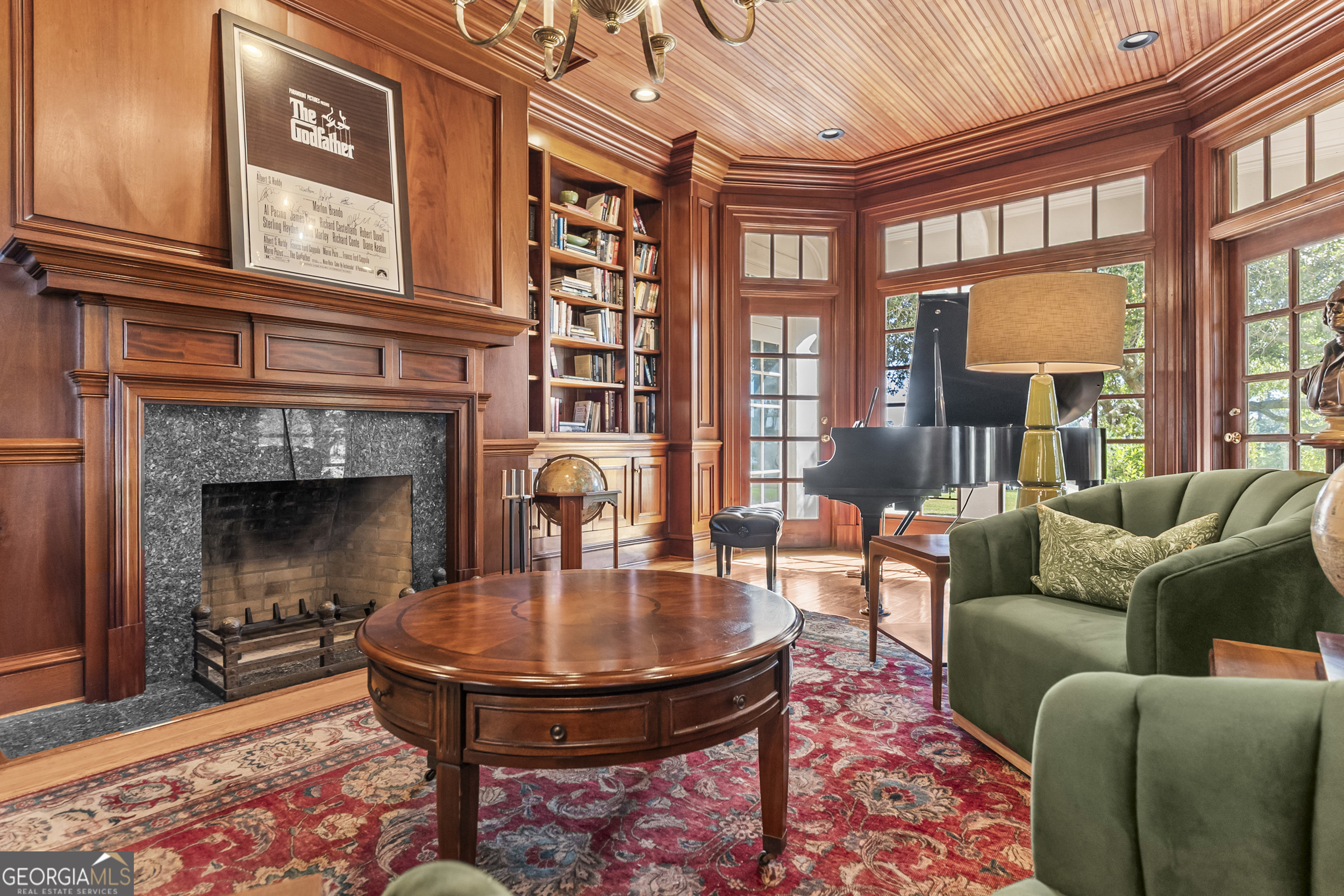 440 Ocilla Highway Fitzgerald, GA 31750 - Photo 18 of 96 a living room with furniture a fireplace and a table