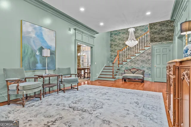 a kitchen with stainless steel appliances granite countertop a stove a refrigerator and a wooden cabinets