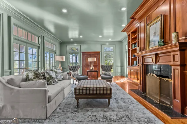 a bedroom with a bed and a lamp