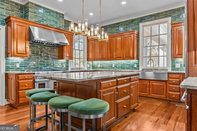 a white bath tub sitting in a bathroom next to a window