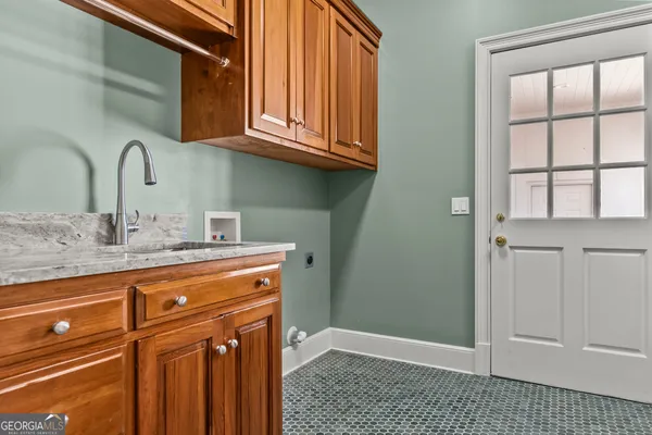 a bed room with a bed and a rug