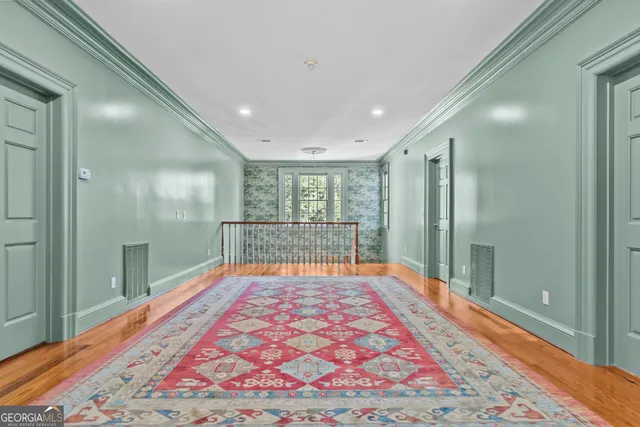 a view of a lake with a yard and mountain view