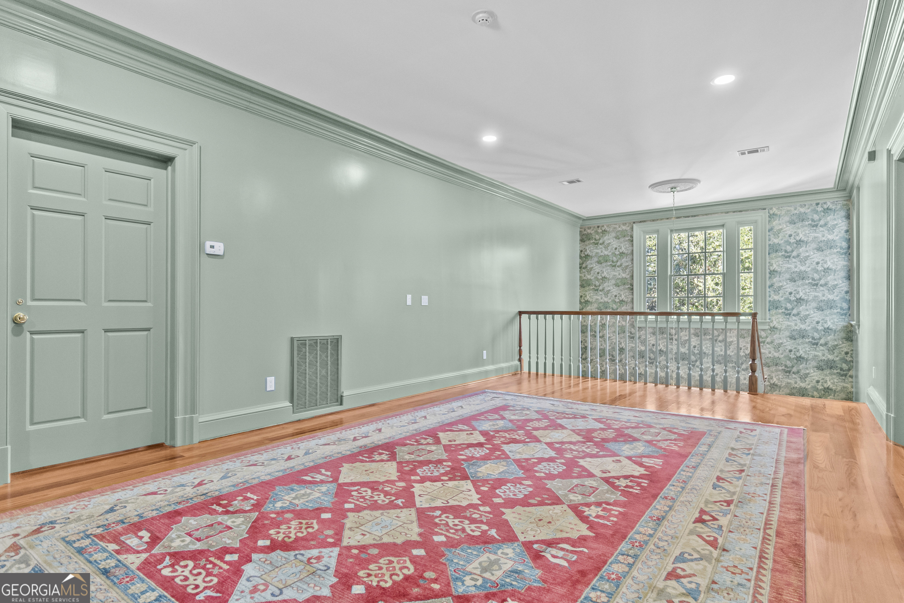 440 Ocilla Highway Fitzgerald, GA 31750 - Photo 45 of 96 a bedroom with a bed and a lamp