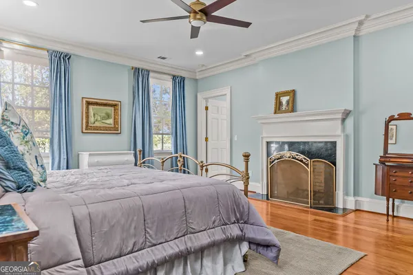 a view of a swimming pool with a yard