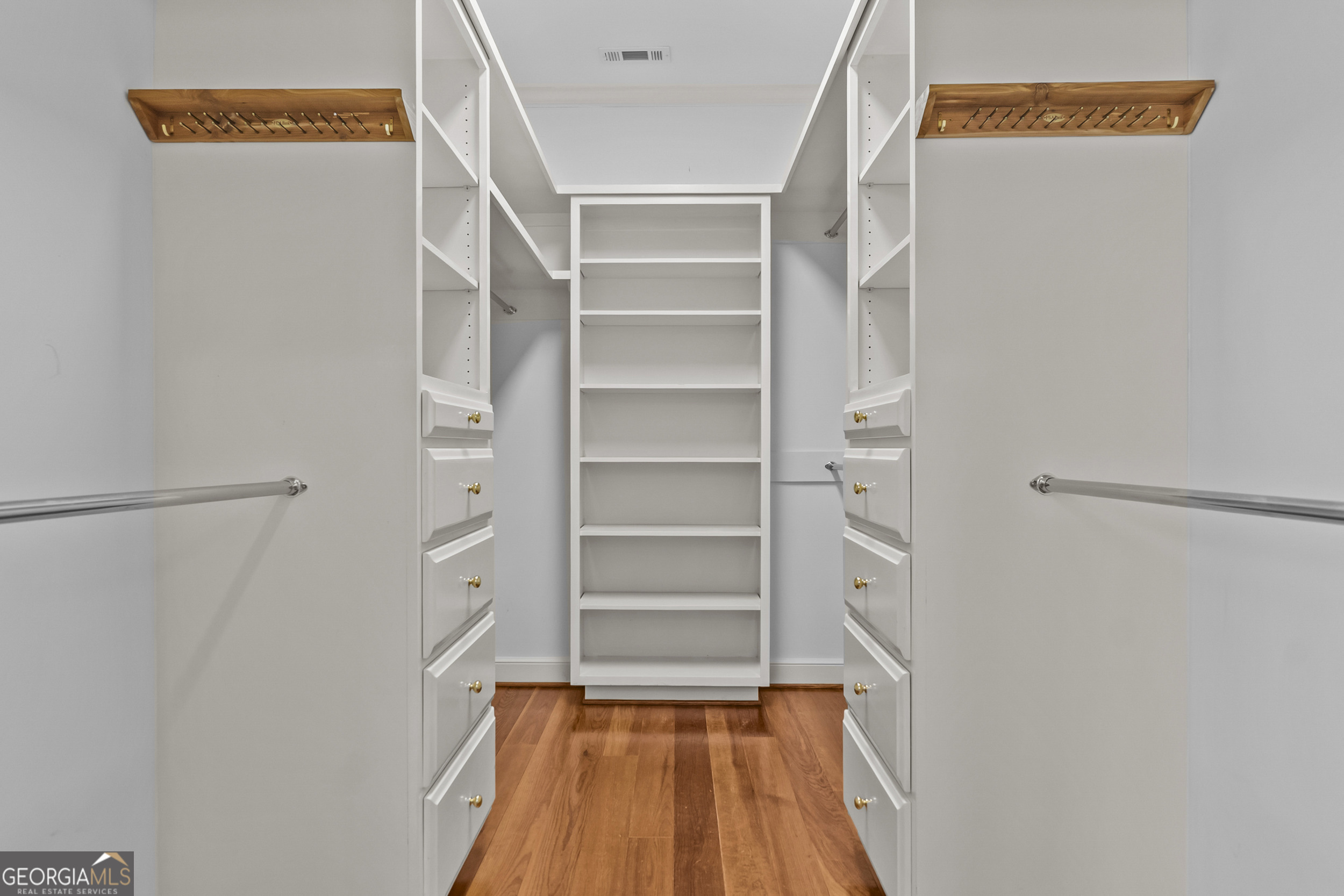 440 Ocilla Highway Fitzgerald, GA 31750 - Photo 59 of 96 a view of walk in closet with empty racks