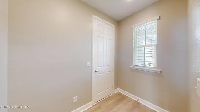 an empty room with windows