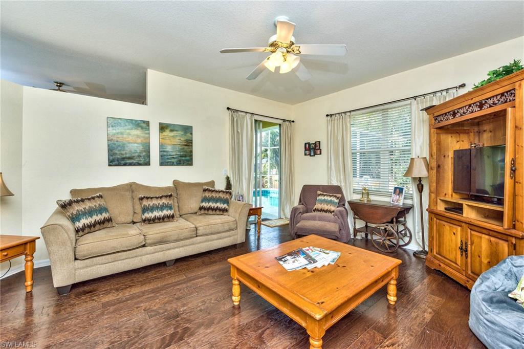 18258 Fuchsia Road Fort Myers, FL 33967 - Photo 11 of 22 a living room with furniture rug and window