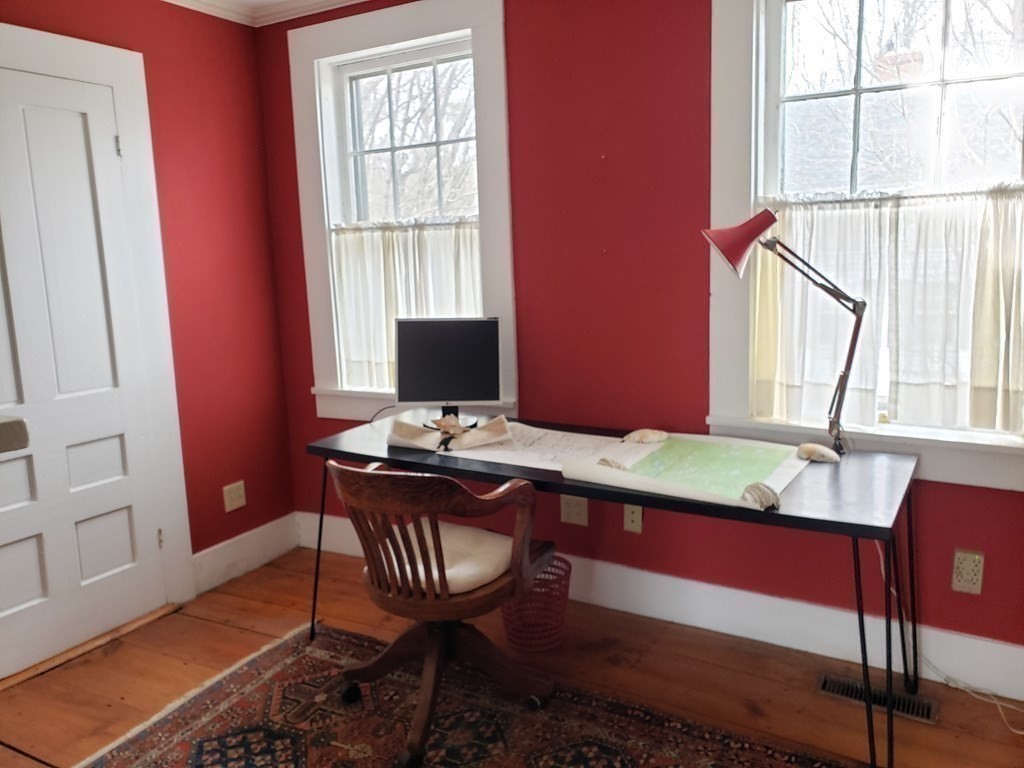 6 Northeast Fitzwilliam Road Royalston, MA 01368 - Photo 11 of 21 a view of a workspace with furniture and a window