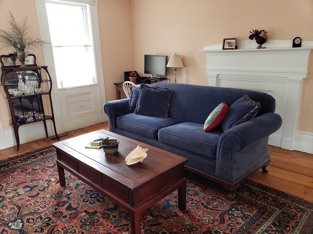 6 Northeast Fitzwilliam Road Royalston, MA 01368 - Photo 6 of 21 a living room with furniture and a fireplace