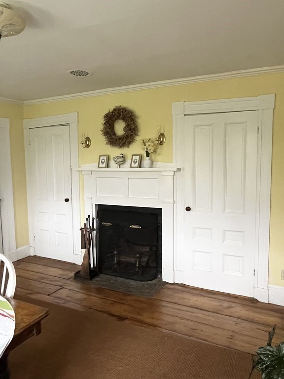 6 Northeast Fitzwilliam Road Royalston, MA 01368 - Photo 8 of 21 a view of an empty room with a fireplace and a window