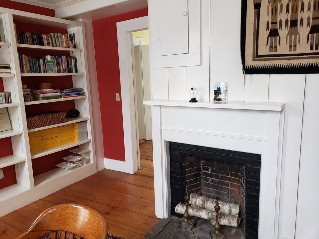 6 Northeast Fitzwilliam Road Royalston, MA 01368 - Photo 9 of 21 a living room with furniture and a fireplace