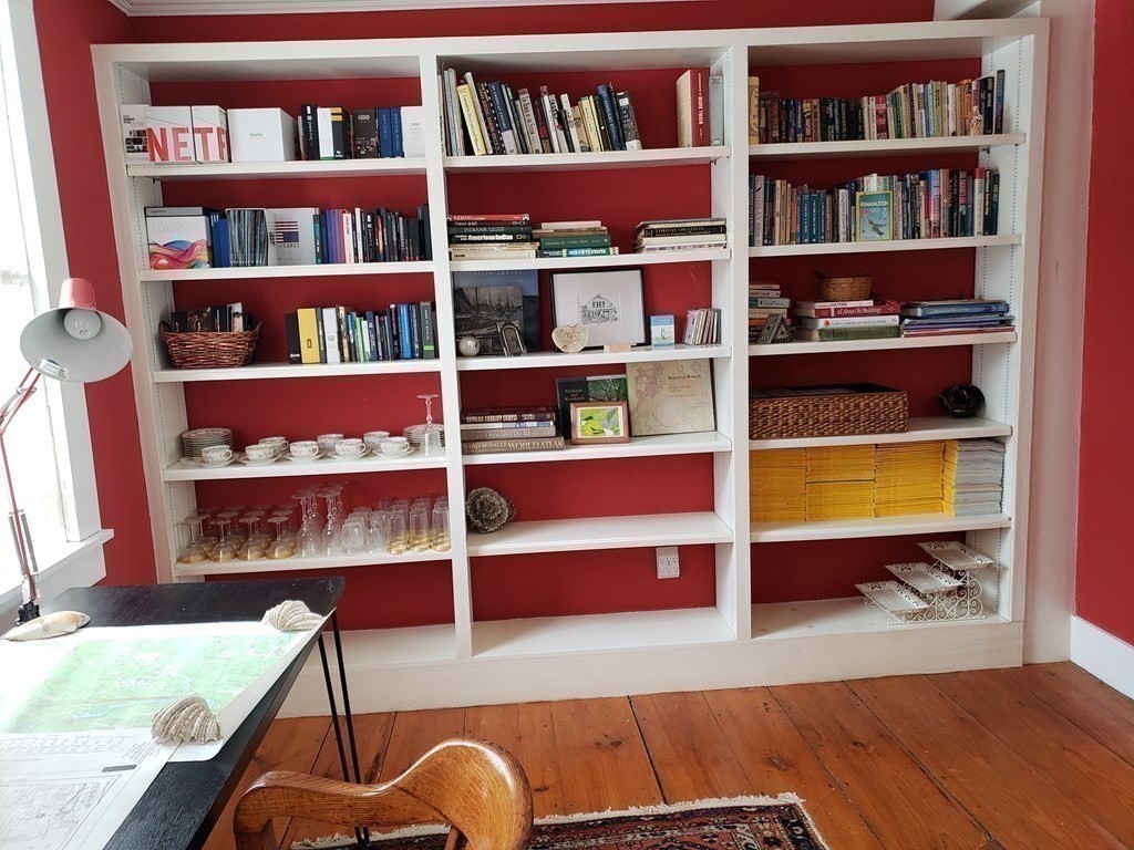 6 Northeast Fitzwilliam Road Royalston, MA 01368 - Photo 10 of 21 a room with bookshelf and a window