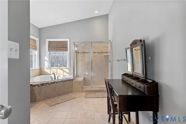 a bathroom with a sink double vanity and a mirror