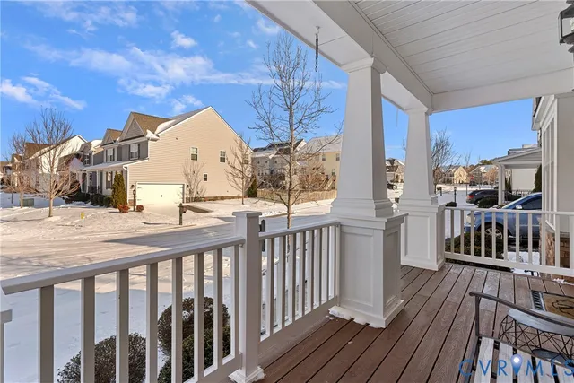a view of a balcony with wooden floor