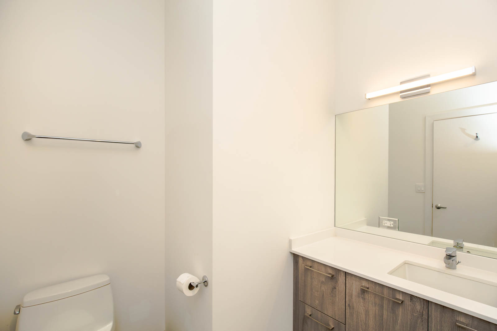 Undisclosed Address Chicago, IL 60641 - Photo 9 of 9 a bathroom with a sink and a mirror