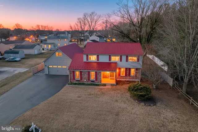 a view of a building with a yard