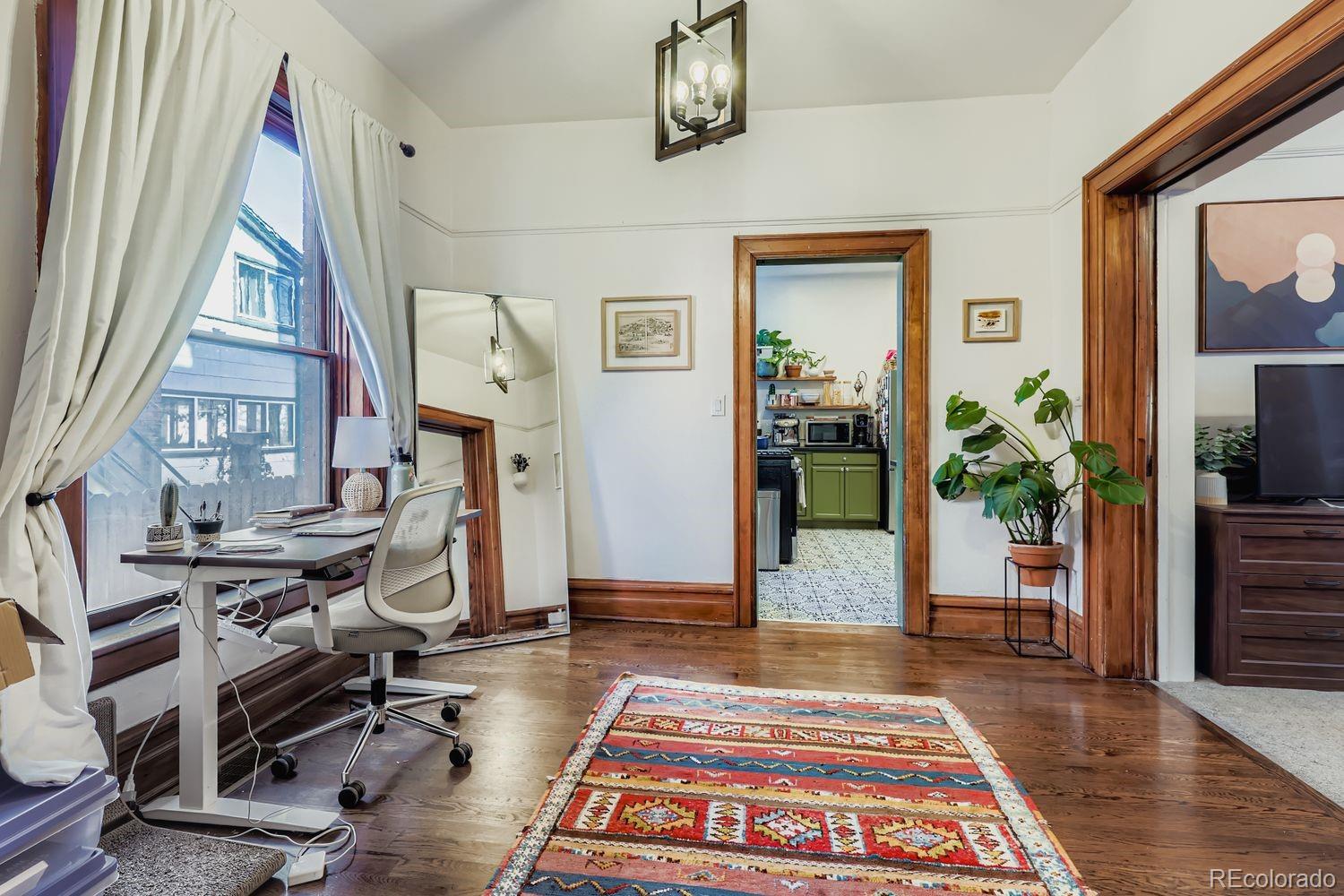 854 North Clarkson Street Denver, CO 80218 - Photo 21 of 34 a view of an entryway with a workspace