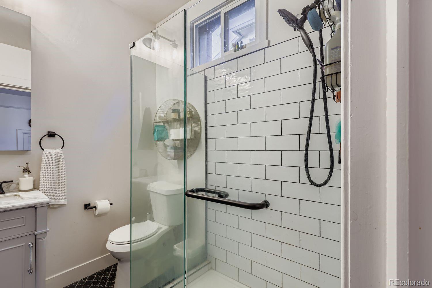 854 North Clarkson Street Denver, CO 80218 - Photo 24 of 34 a bathroom with a shower