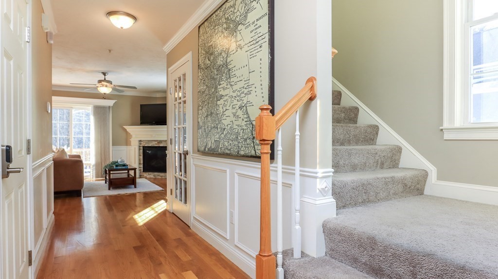 85 Dudley Road, Unit 85 Berlin, MA 01503 - Photo 4 of 39 a view of entryway and hall with wooden floor