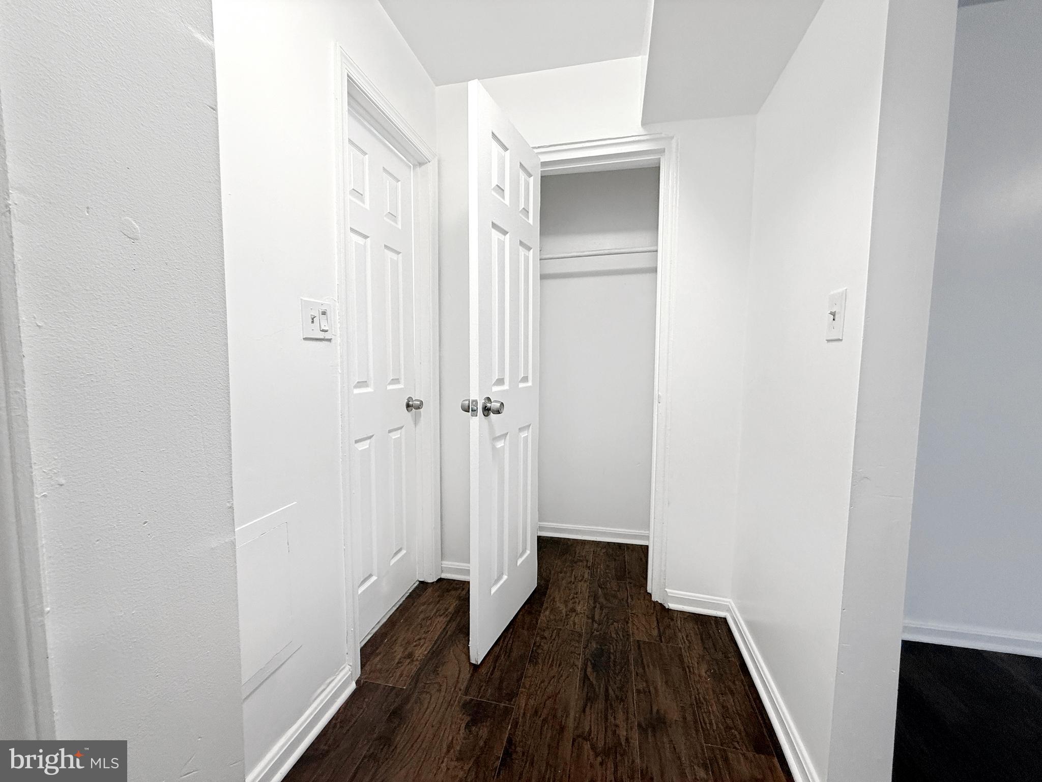 506 Eastern Avenue Northeast, Unit 102 Washington, DC 20019 - Photo 13 of 13 a view of a room with wooden floor