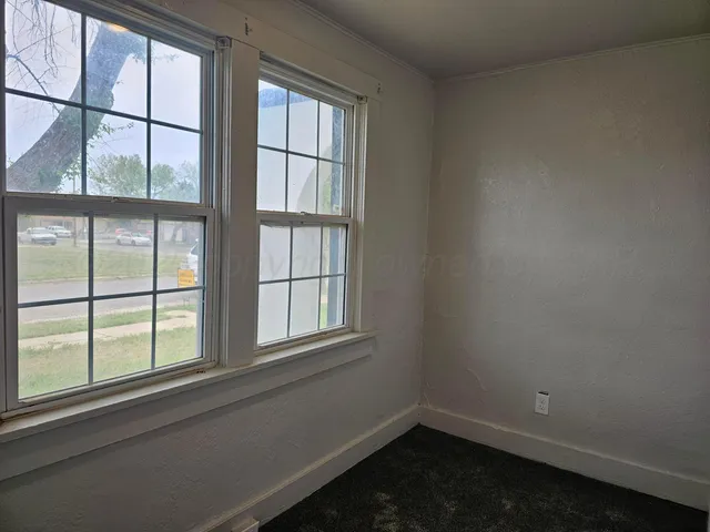 an empty room with a window