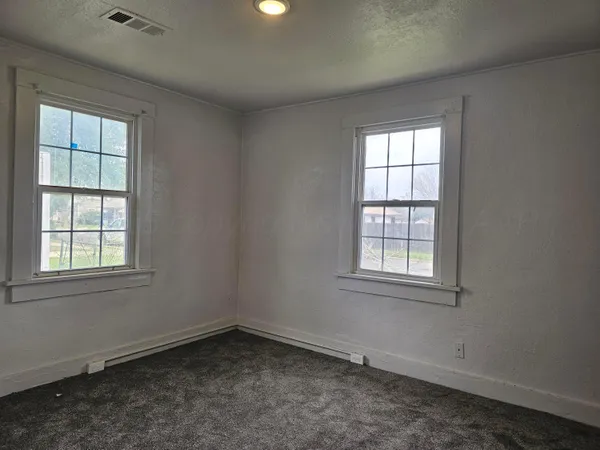 an empty room with a window