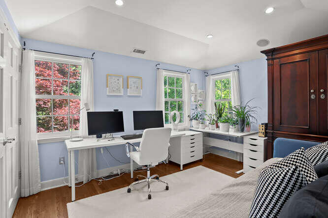 40 Tulip Tree Lane Darien, CT 06820 - Photo 17 of 27 a view of a workspace with furniture and a window