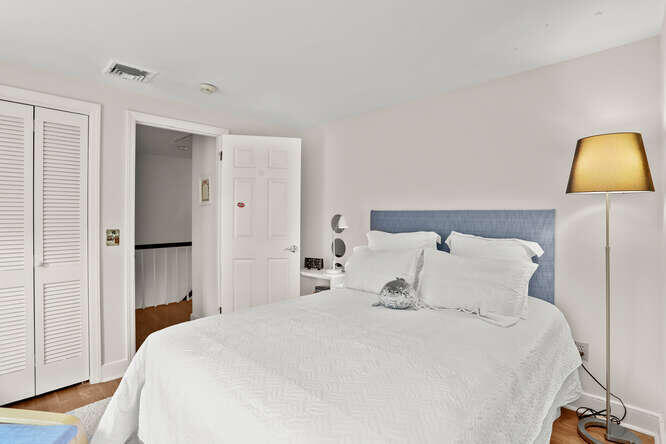 40 Tulip Tree Lane Darien, CT 06820 - Photo 18 of 27 a bedroom with a bed and a closet