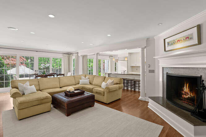 40 Tulip Tree Lane Darien, CT 06820 - Photo 7 of 27 a living room with furniture and a fireplace